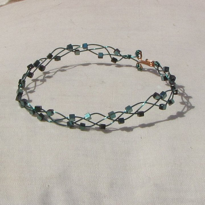 Sea-green coloured copper plaited bracelet - detail