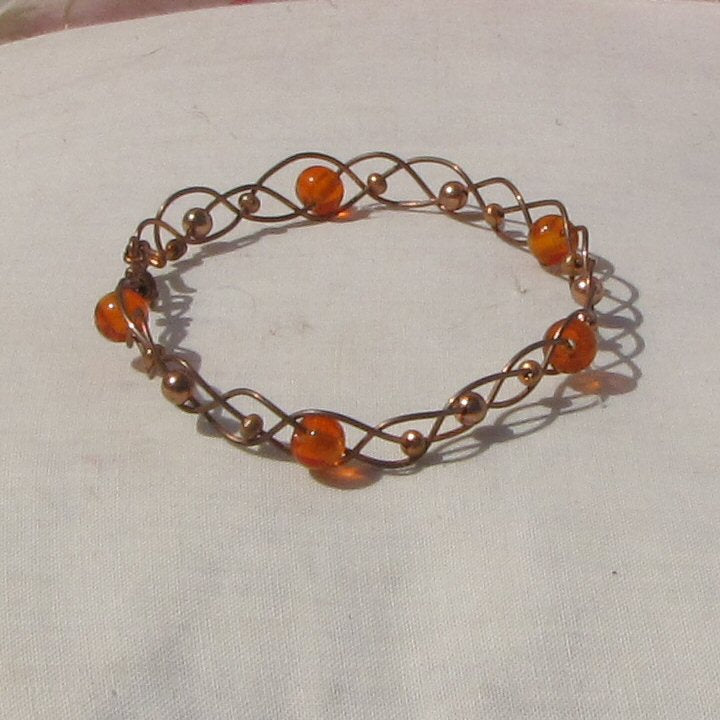 Copper and orange glass beads plaited bracelet - detail