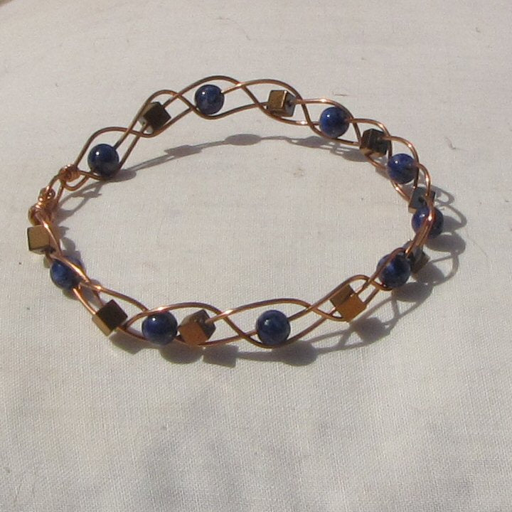 Copper plaited bracelet with lapis lazuli and copper hematite cubes - detail