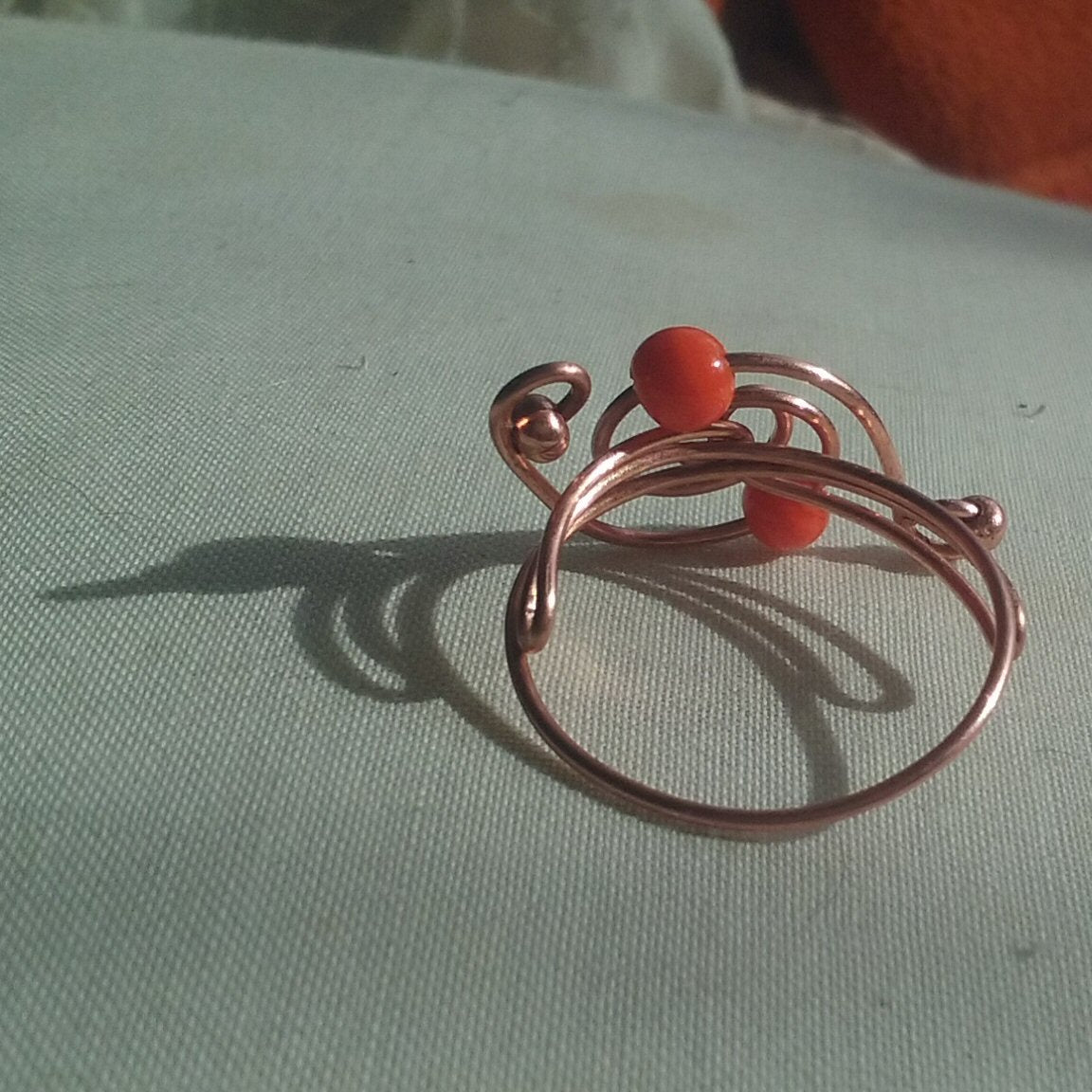 Copper Spiral ring orange beads - detail