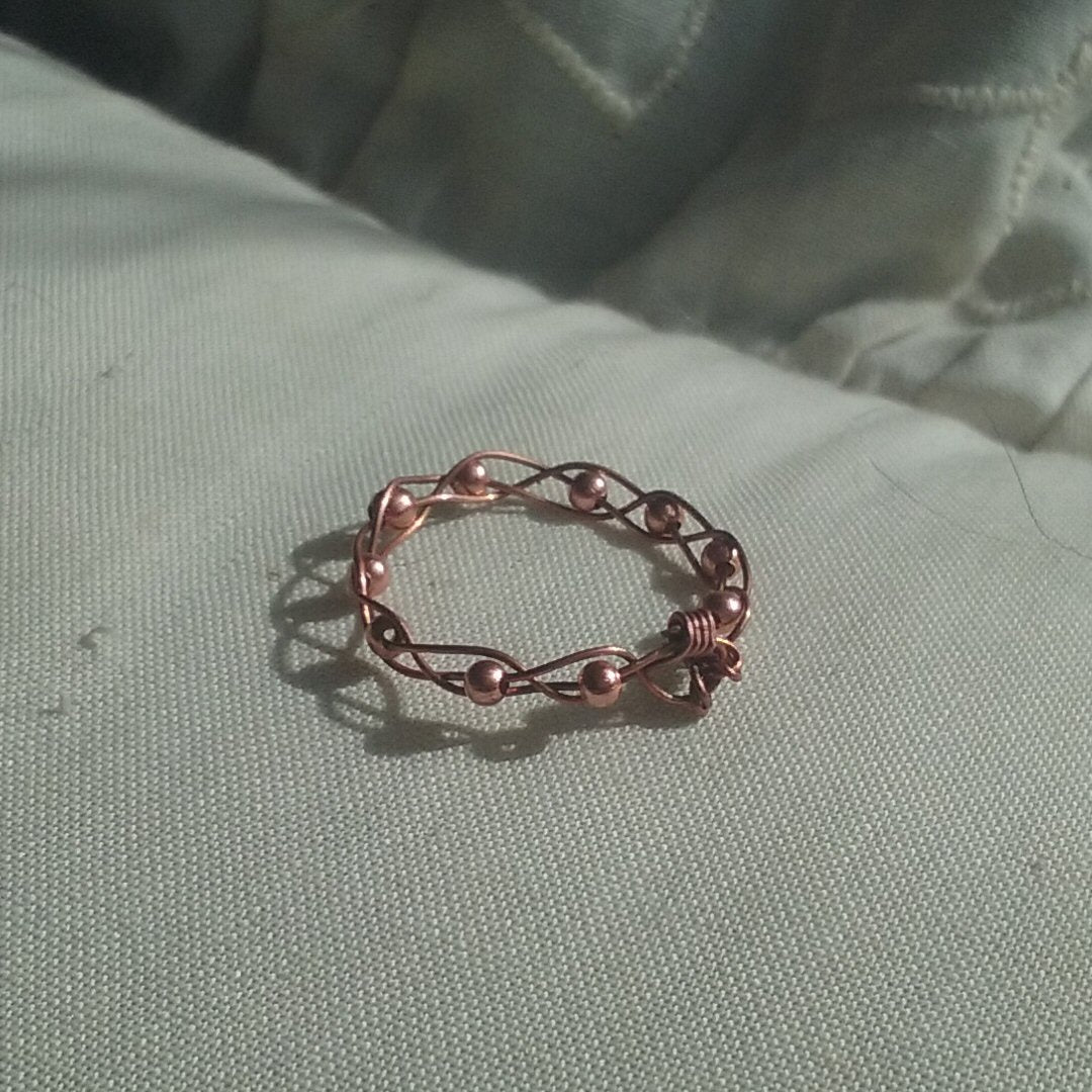 Copper braided ring and beads - detail