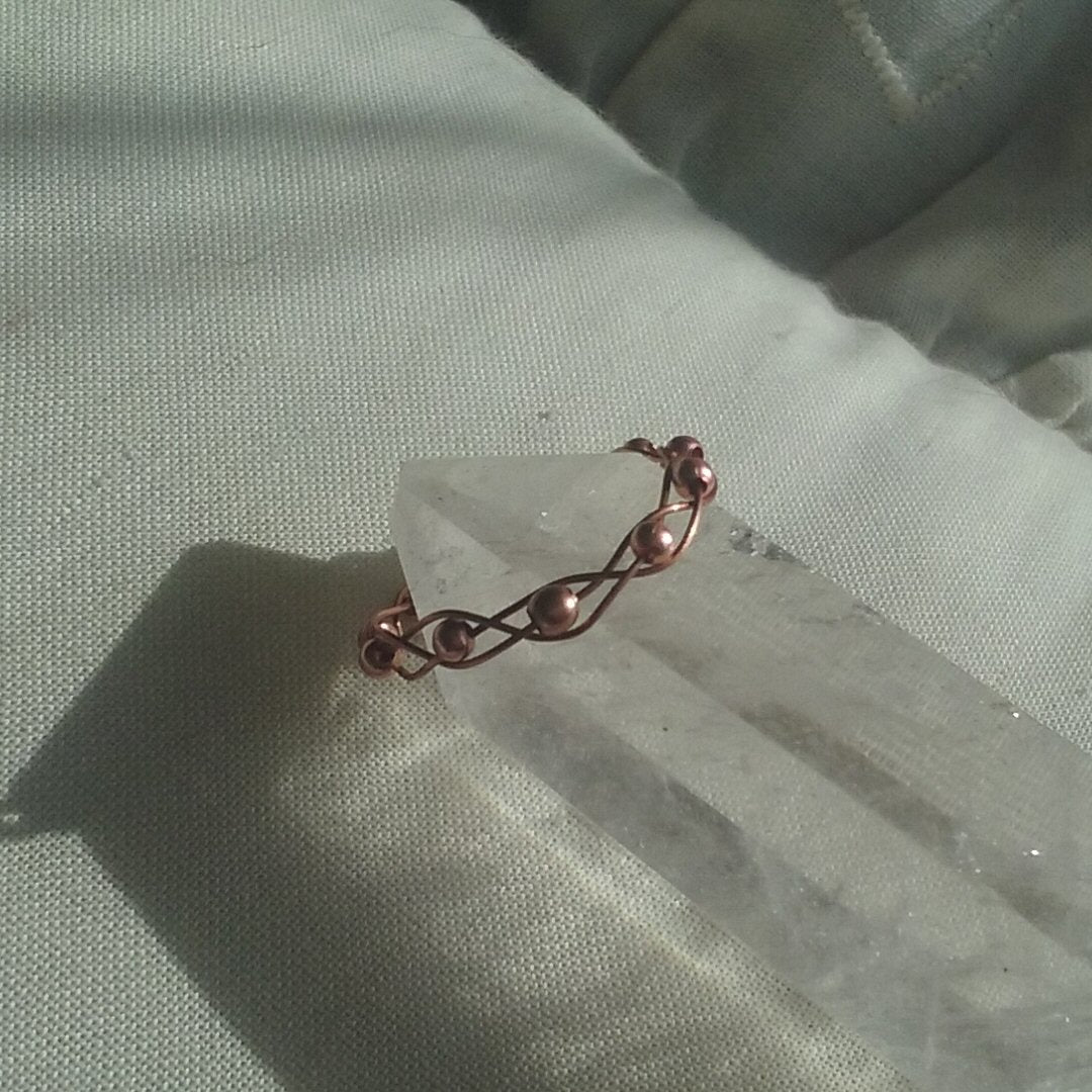Copper braided ring and beads - detail