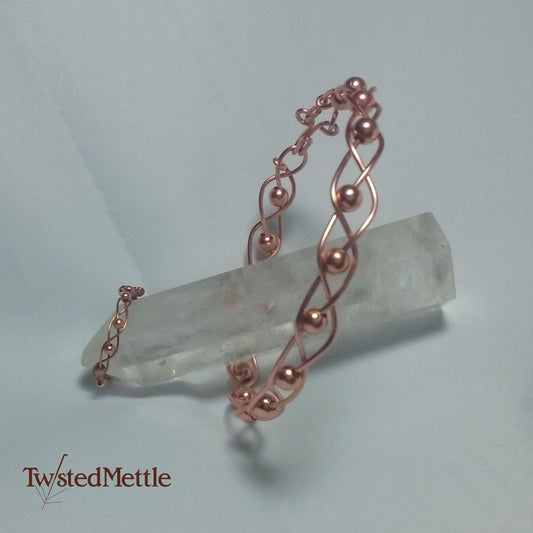 Copper set. Braided ring and bracelet with beads