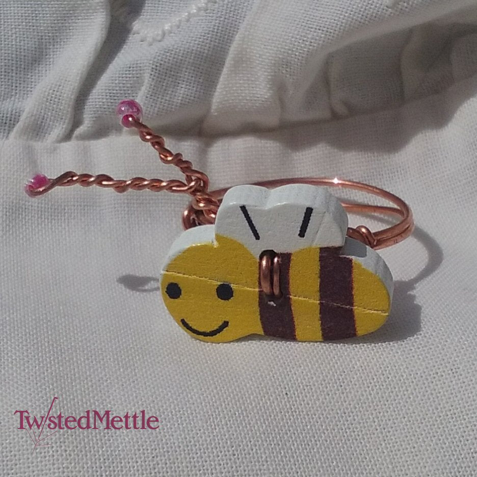 Bee ring, with copper twisted antenna topped with a pink bead