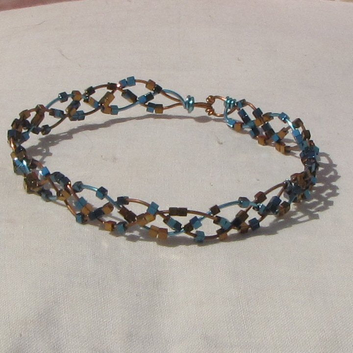 Copper and blue plaited bracelet - detail