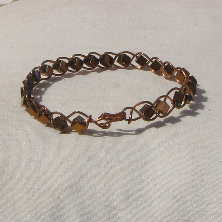 Copper plaited bracelet with copper covered hematite cube beads - detail