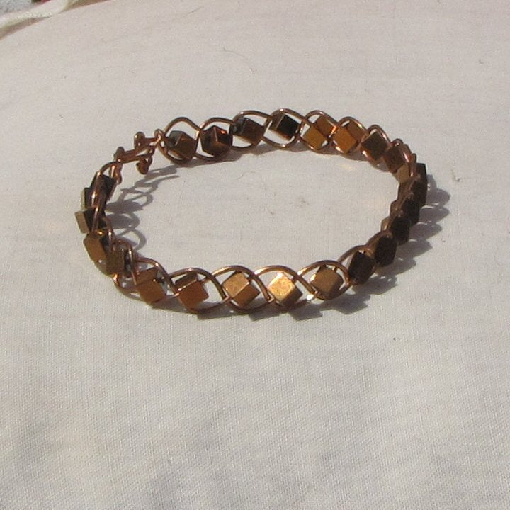 Copper plaited bracelet with copper covered hematite cube beads - detail