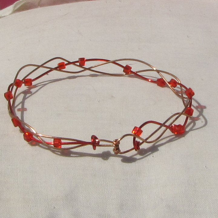 Copper and red coloured copper open plait bracelet - detail