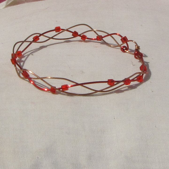 Copper and red coloured copper open plait bracelet - detail