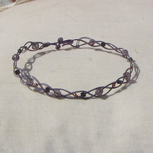 Double strand grey coloured copper plaited bracelet with amethyst, copper and purple beads