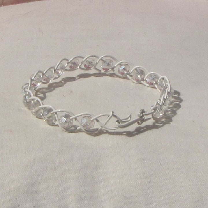 Ivory coloured copper plaited bracelet with crystal beads
