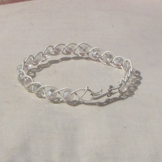 Ivory coloured copper plaited bracelet with crystal beads