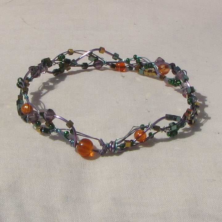 Purple and sea-green coloured copper plaited bracelet, amethyst