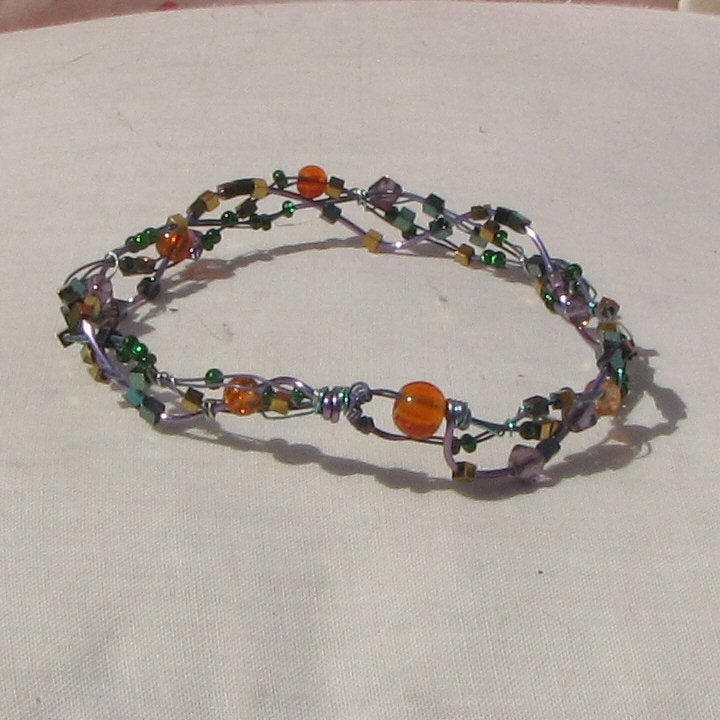 Purple and sea-green coloured copper plaited bracelet - detail