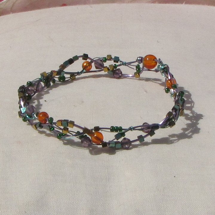 Purple and sea-green coloured copper plaited bracelet - detail