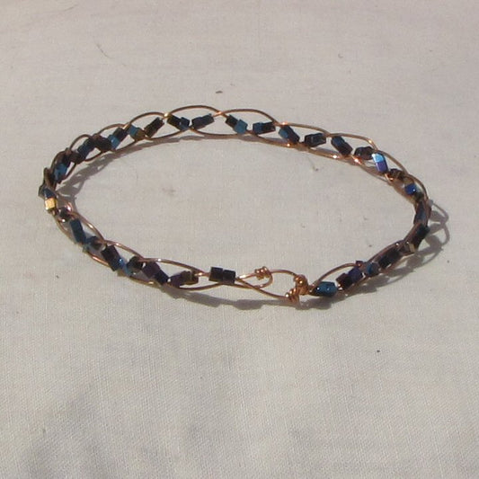 Delicate copper plaited bracelet with copper, blue + purple hematite cubes